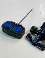TOYBOI 1:18 SCALE RC RACING CAR WITH SPRAY EFFECT & LIGHTS